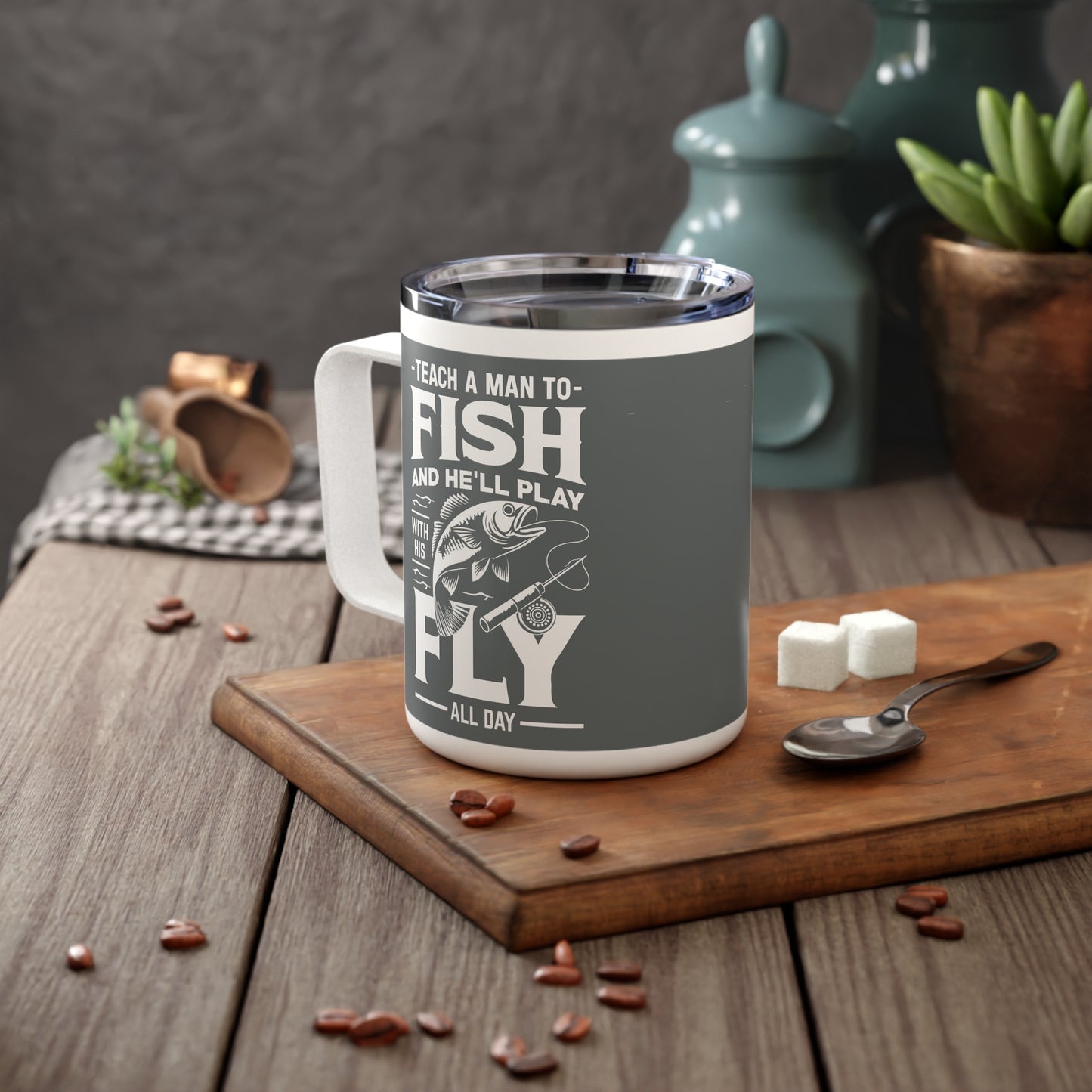 Teach a man to fish and he'll play with his fly all day thermal mug, spill proof, stainless steel